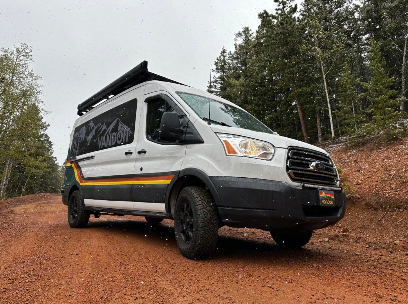 hooked up and ready for adventure.|Camper van rental under a vibrant sunset with a custom-designed van