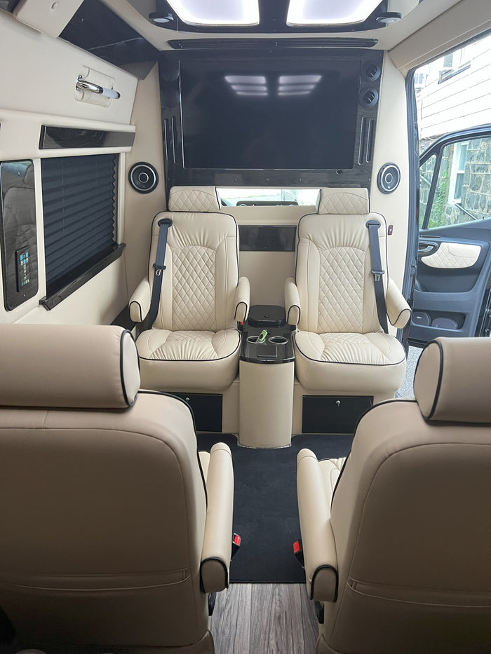 offering luxury travel.|Step into luxury with this RV rental. A spacious interior boasts plush cream seats