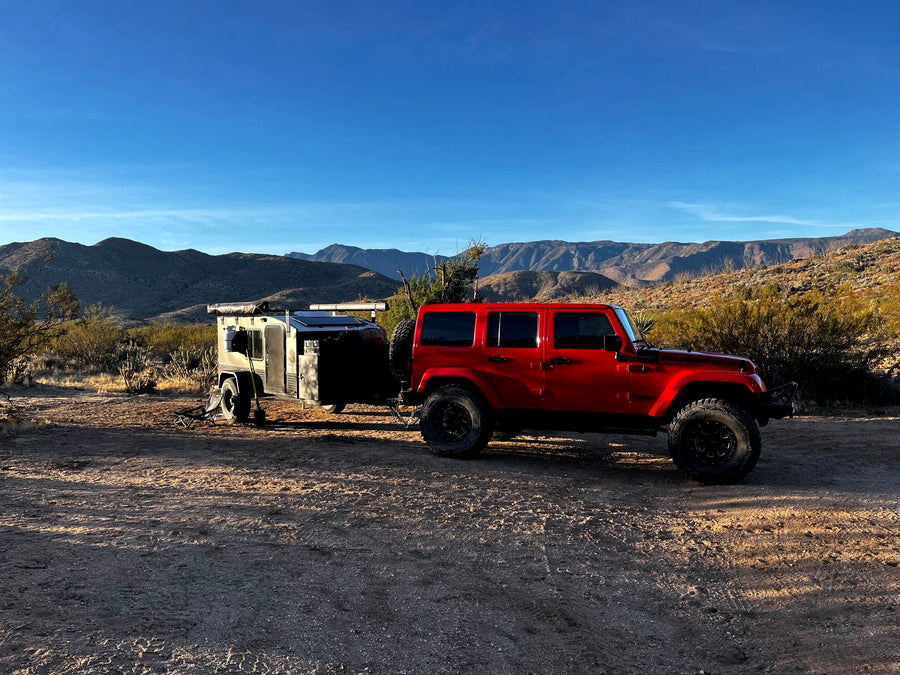 complementing our RV rental experience at night.|Snowy stop: This off-road RV rental trailer