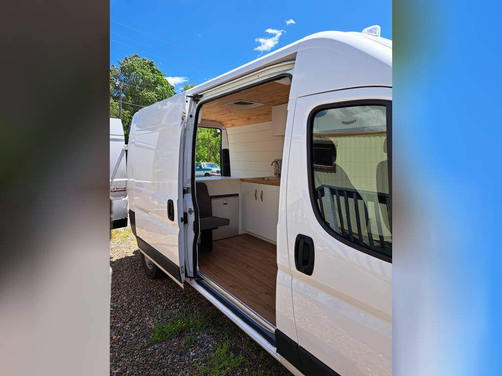 perfect for an RV rental.|Inside an RV rental: comfy bed