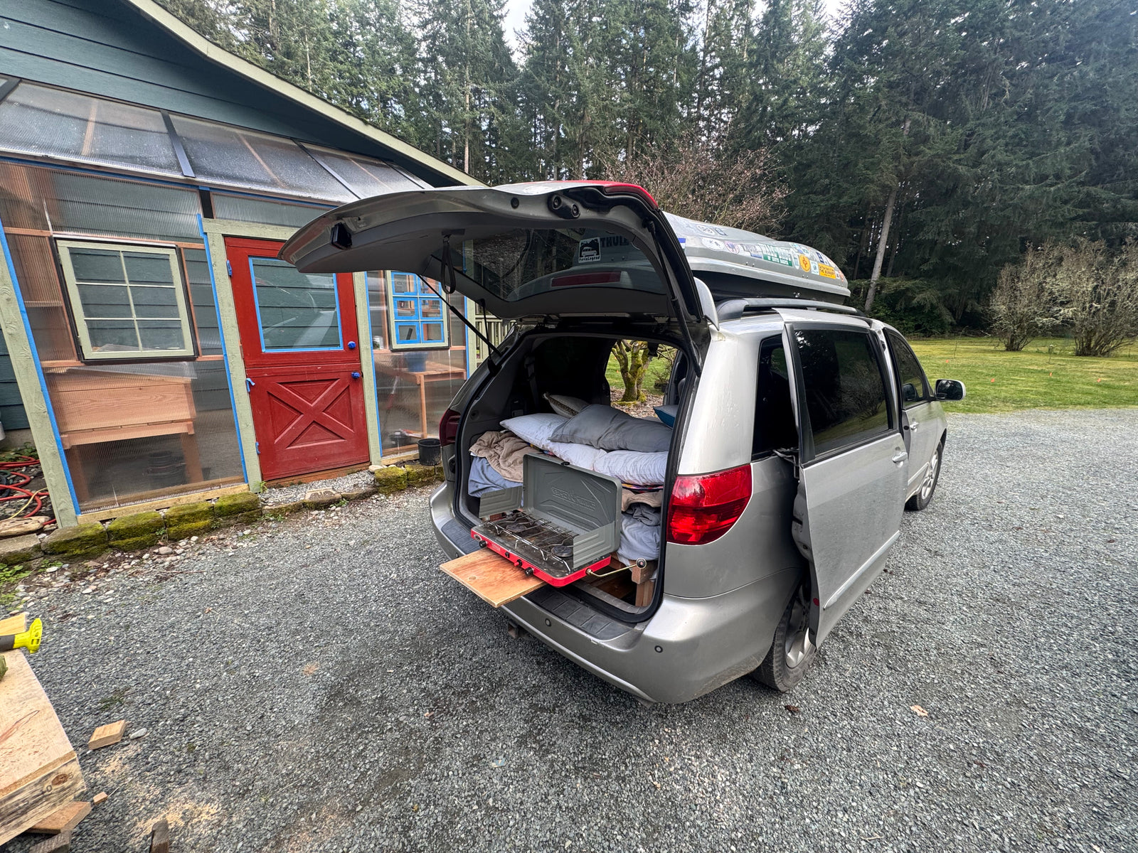 parked by grassy hills. A flexible travel vehicle