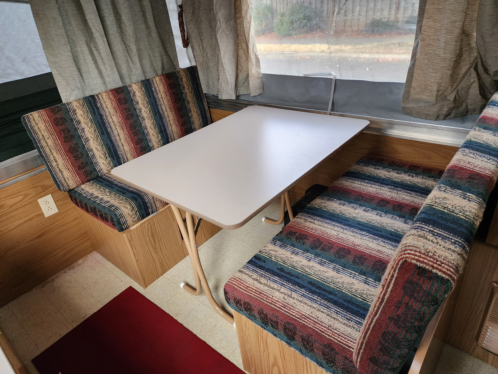 ideal for compact dining.|RV rental's compact kitchen setup: sink