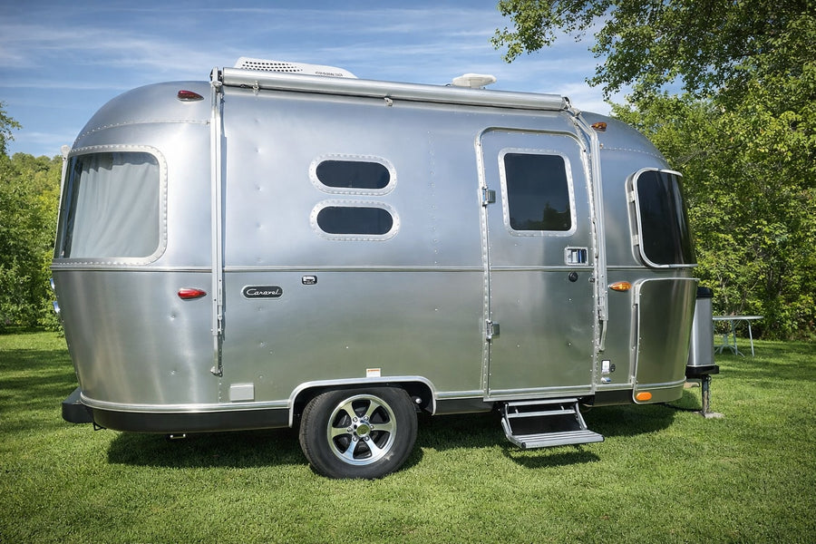 offering a perfect camping escape.|Floor plan of a compact RV rental