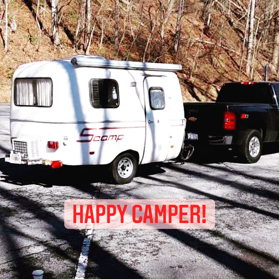 This white Scamp travel trailer