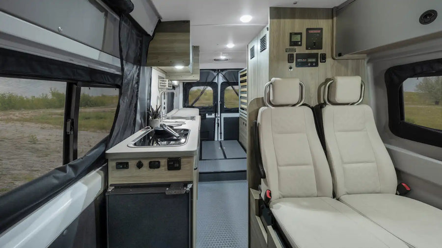 wooded campsite.|Step into this well-equipped rv rental. Features a full kitchen