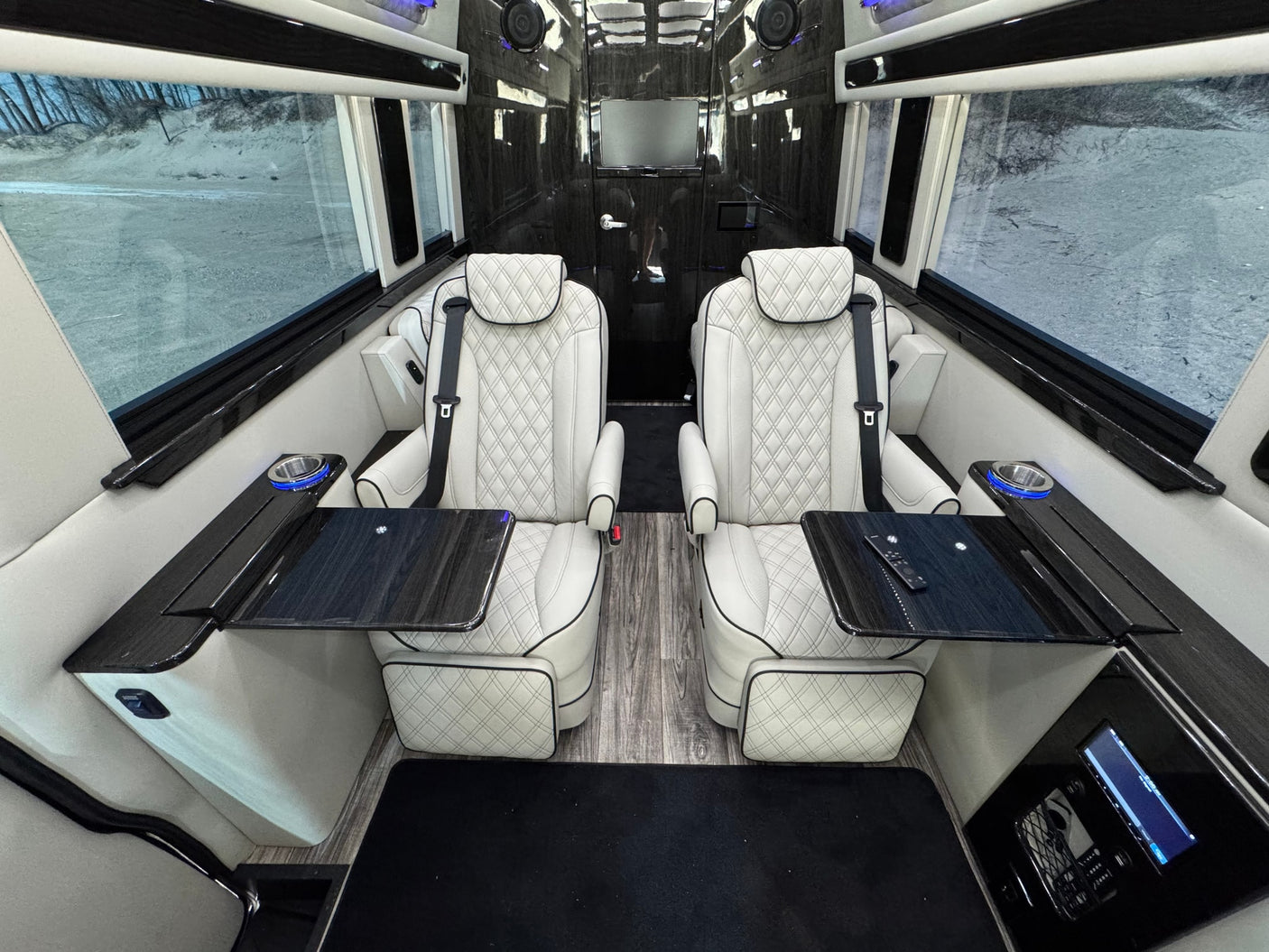 and a sandy outdoor area with volleyball nets visible.|Detailed RV rental dashboard: steering wheel
