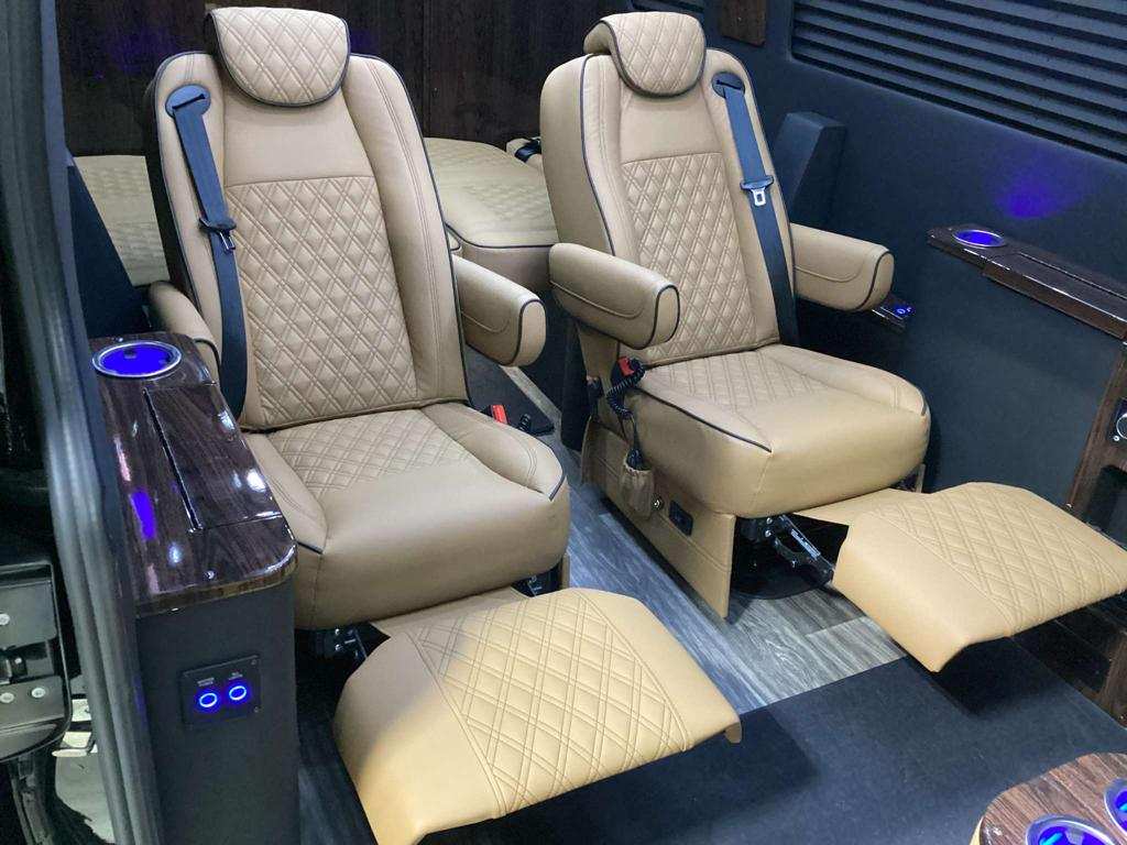 ideal for comfort.|Step into luxury with this RV rental! Features plush tan leather seats — photo 7