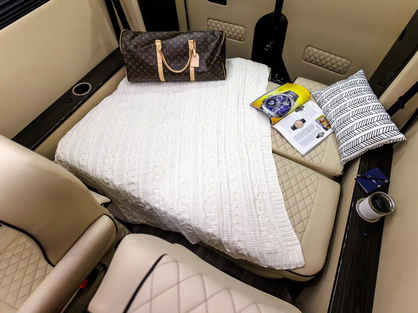 and infotainment. Modern cabin.|Upscale RV rental interior boasts custom ceiling lights — photo 9