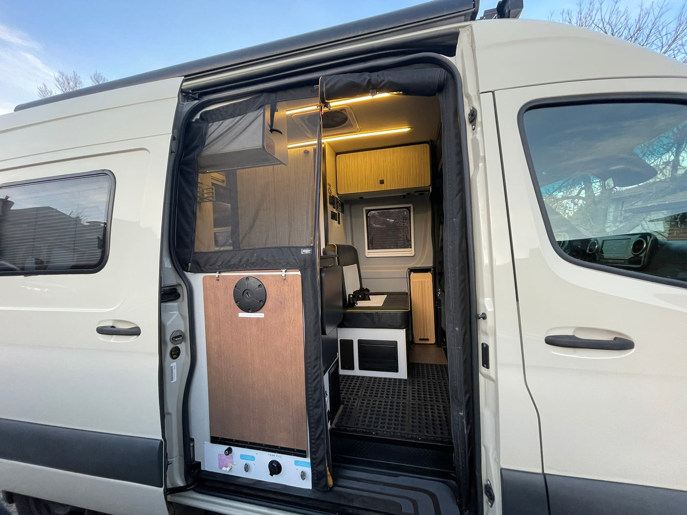 rugged canyon.|RV rental van on a scenic desert road