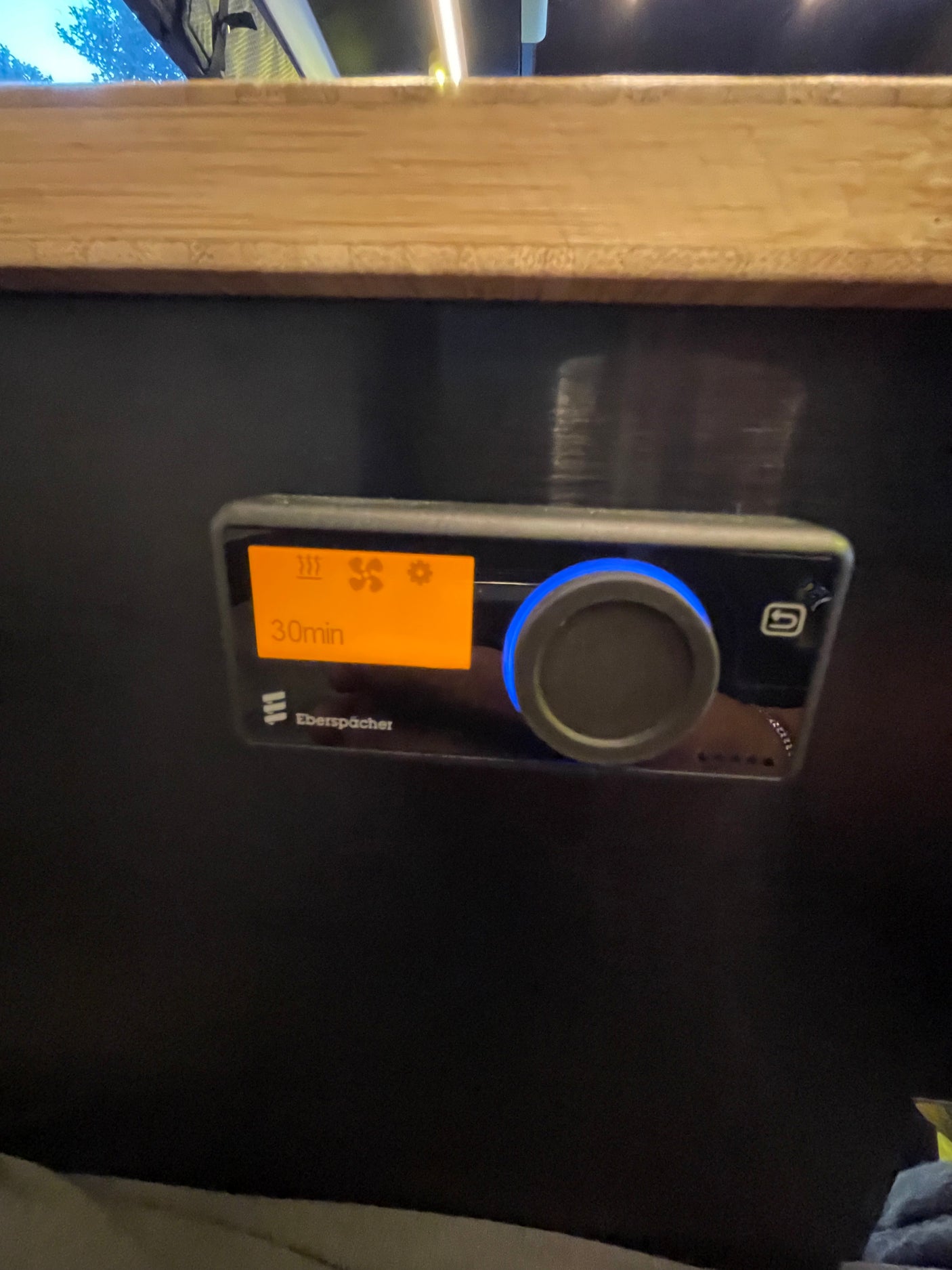 Eberspächer control panel in an RV rental, set to a 30min heater/fan timer for climate comfort.