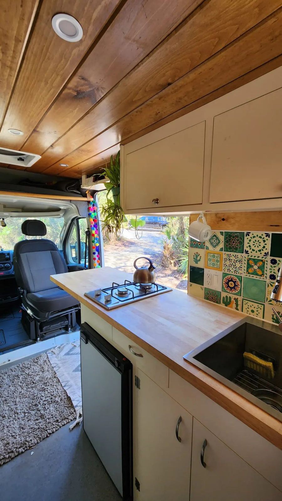 perfect for an RV rental adventure.|Compact RV rental bathroom with white walls
