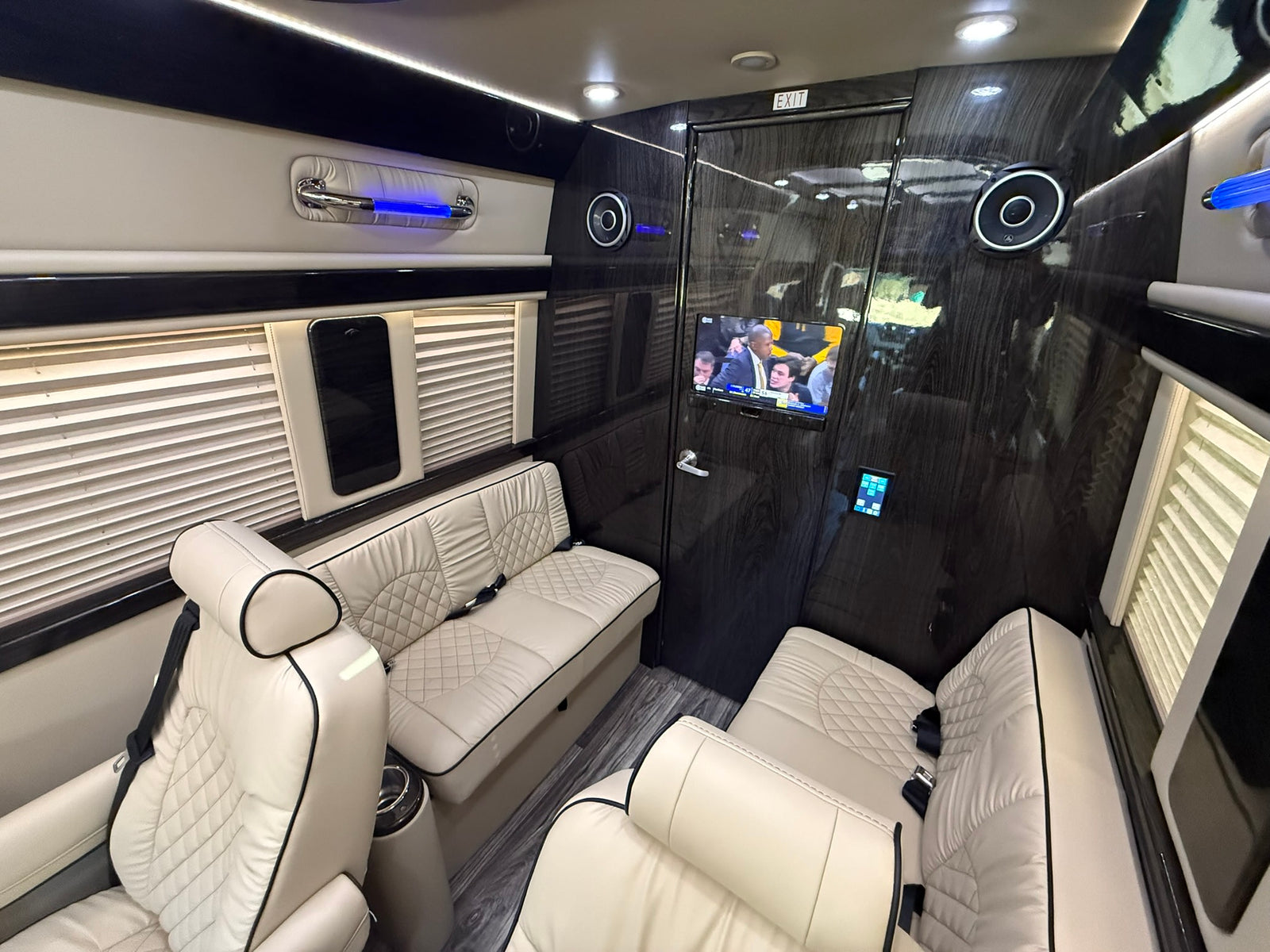 and comfortable tan front seats.|Luxurious rv rental interior with cream quilted leather seats