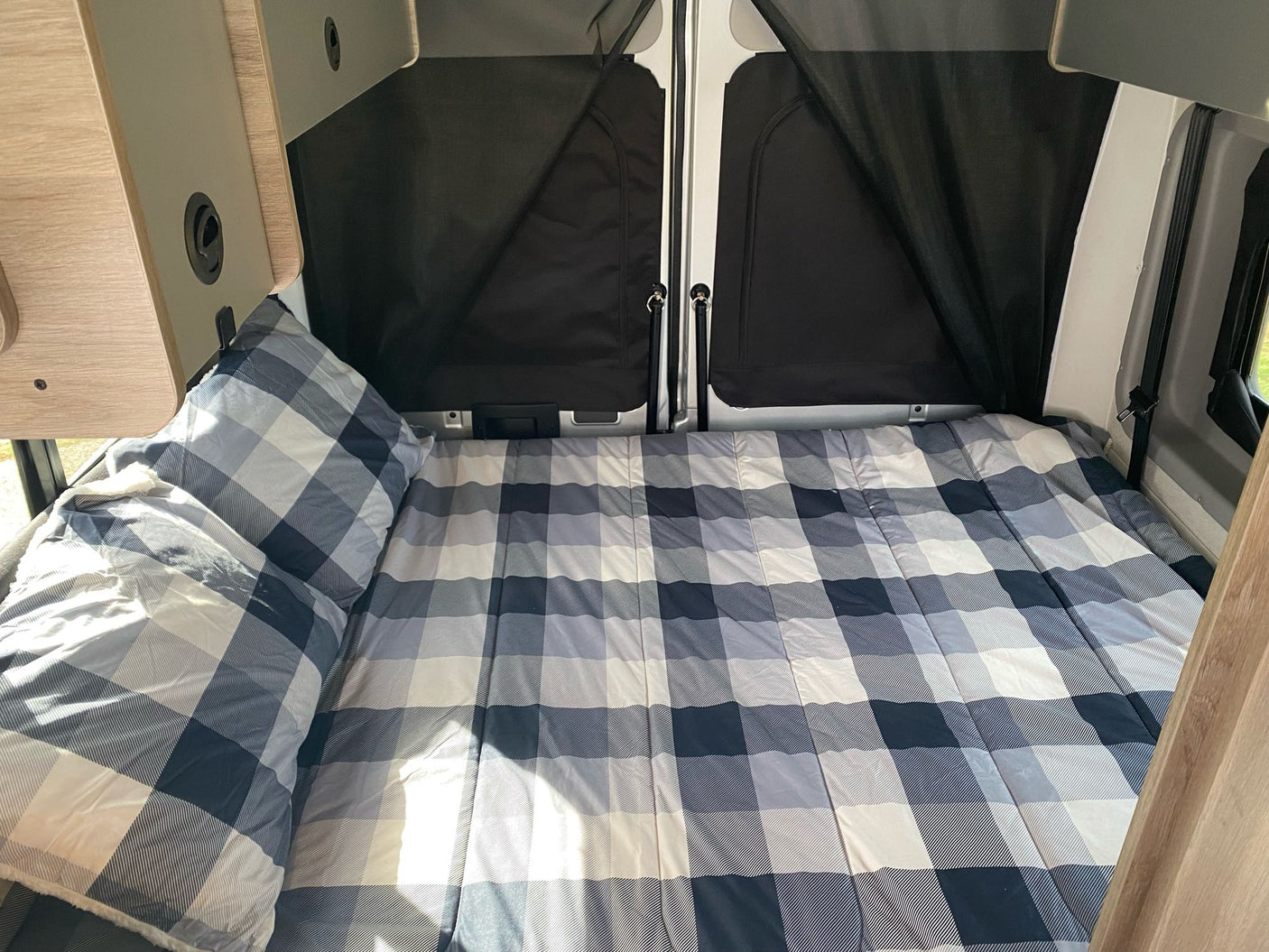 and central console controls.|RV rental interior: Kitchenette with sink