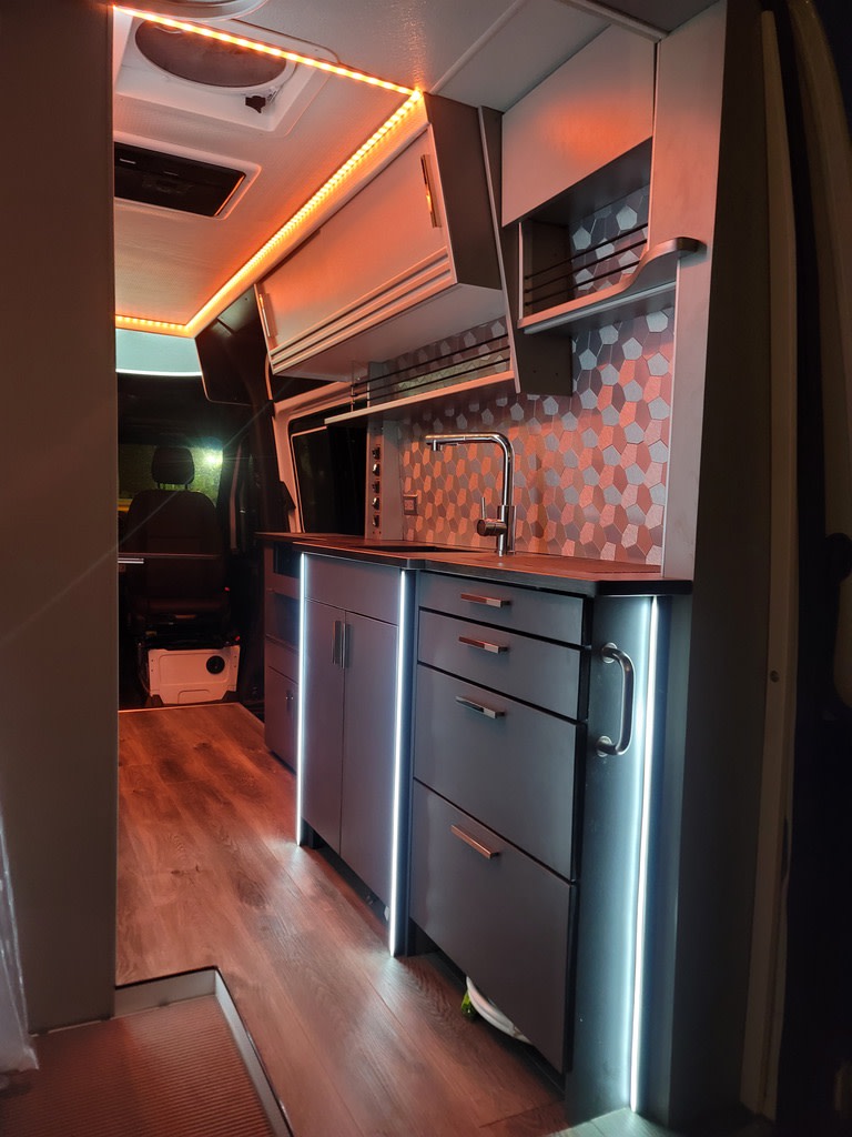 a compact kitchen with sink
