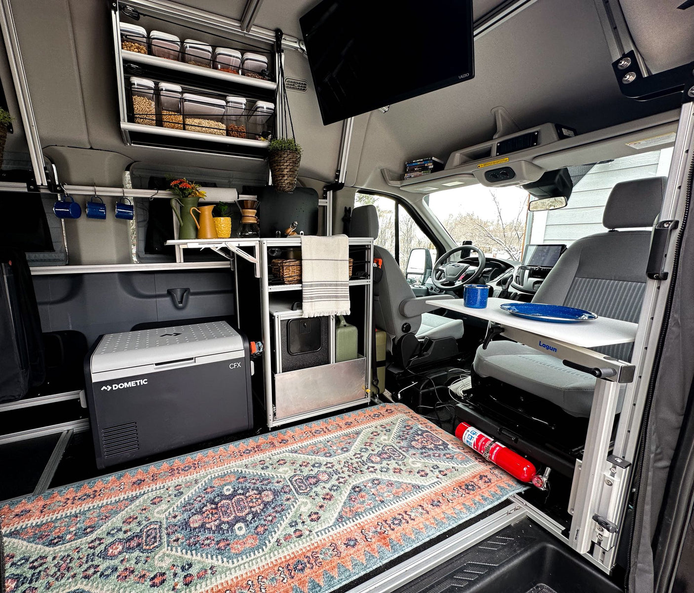 TV & smart storage.|This cozy rv rental interior features clever storage