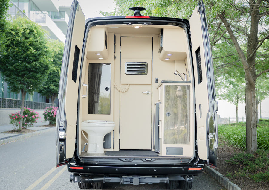 and privacy blinds.|Luxury RV rental interior: cream quilted leather seating