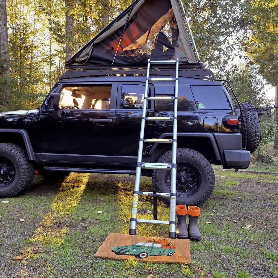 parked outdoors. Perfect RV rental for your next adventure camping trip!|A pineapple plushie