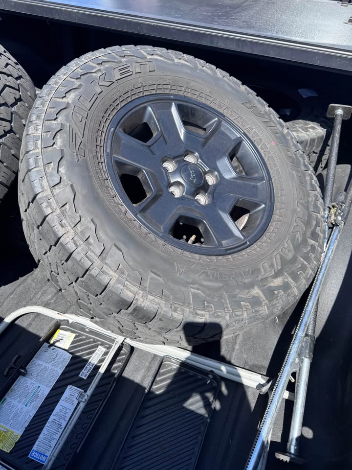 Four Jeep Rims with tires in Tucson, AZ (photo 2)