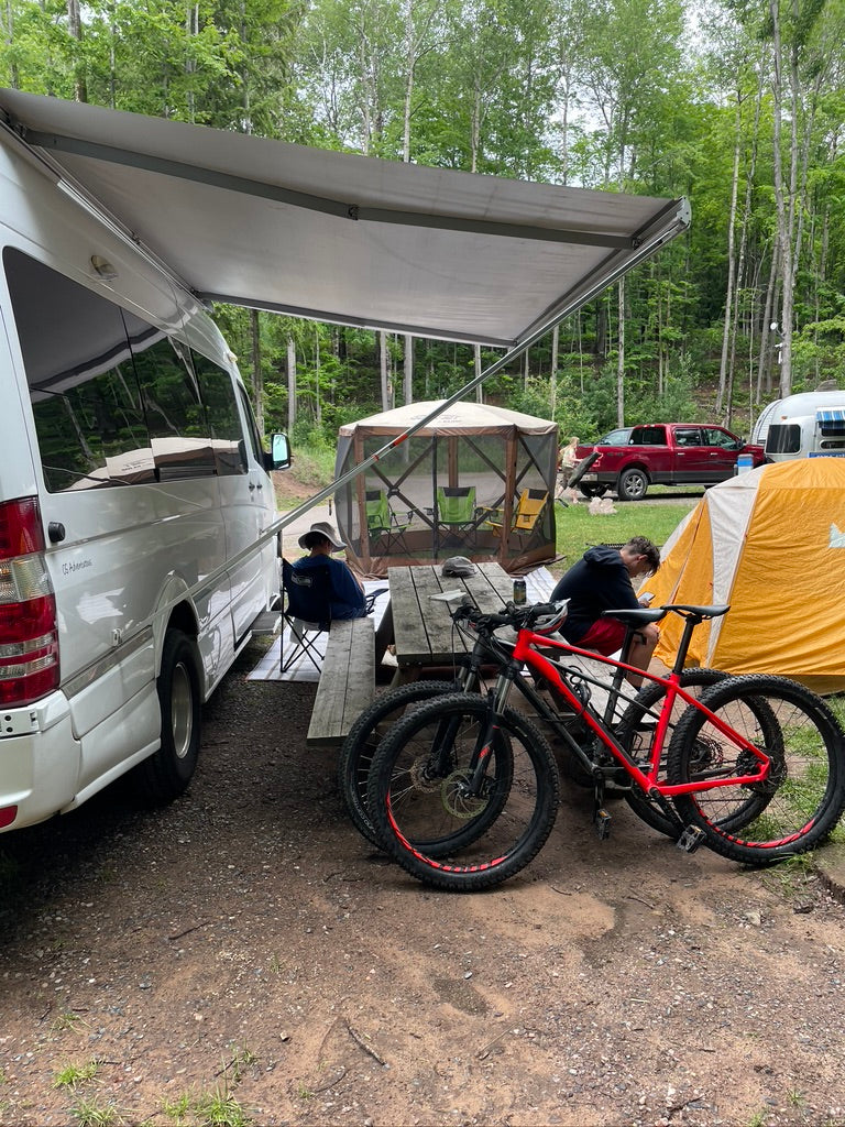 and a clear view of the road ahead.|RV rental kitchen view: features stainless fridge