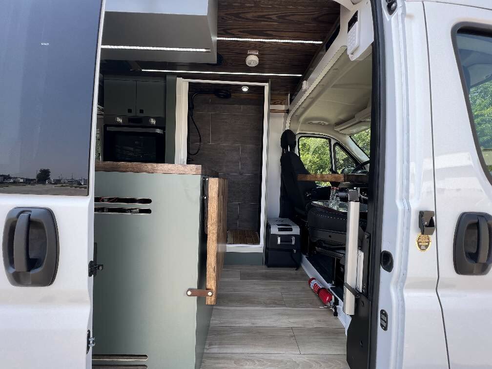 ready for adventure.|Rooftop setup for an RV rental: solar panels