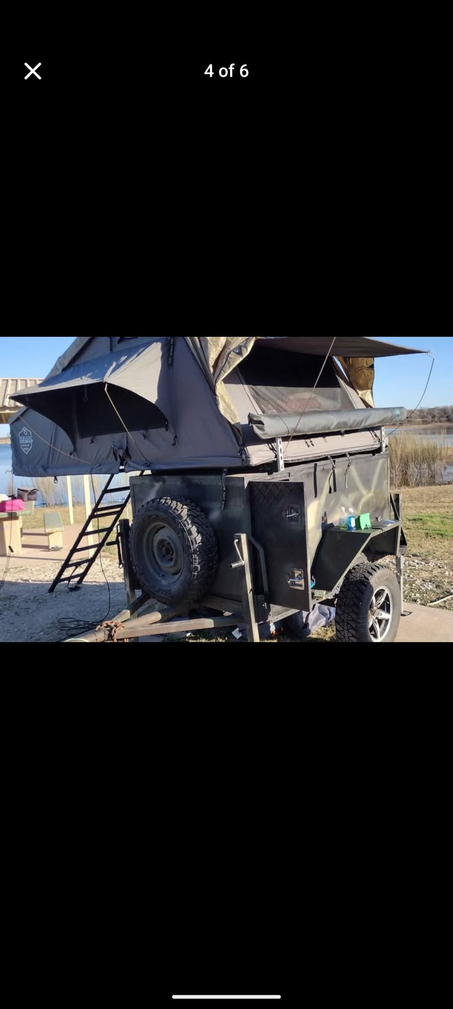 RV rental alternative: a rooftop tent on an overland trailer hitched to a truck