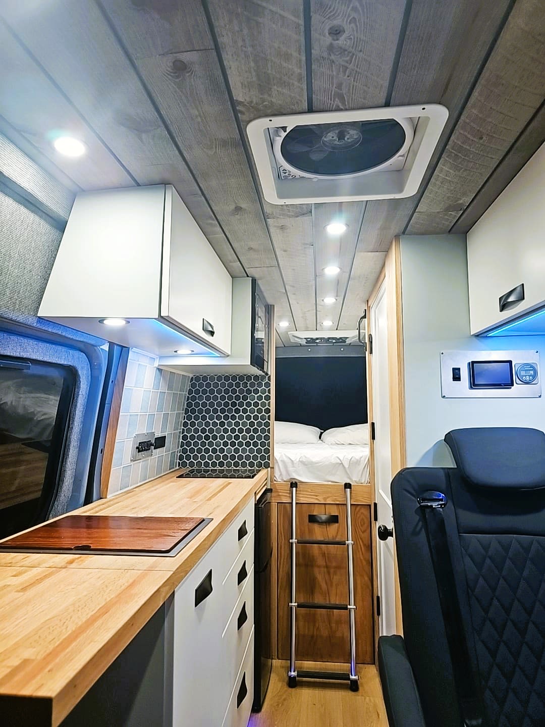 Modern RV rental interior: wood ceilings
