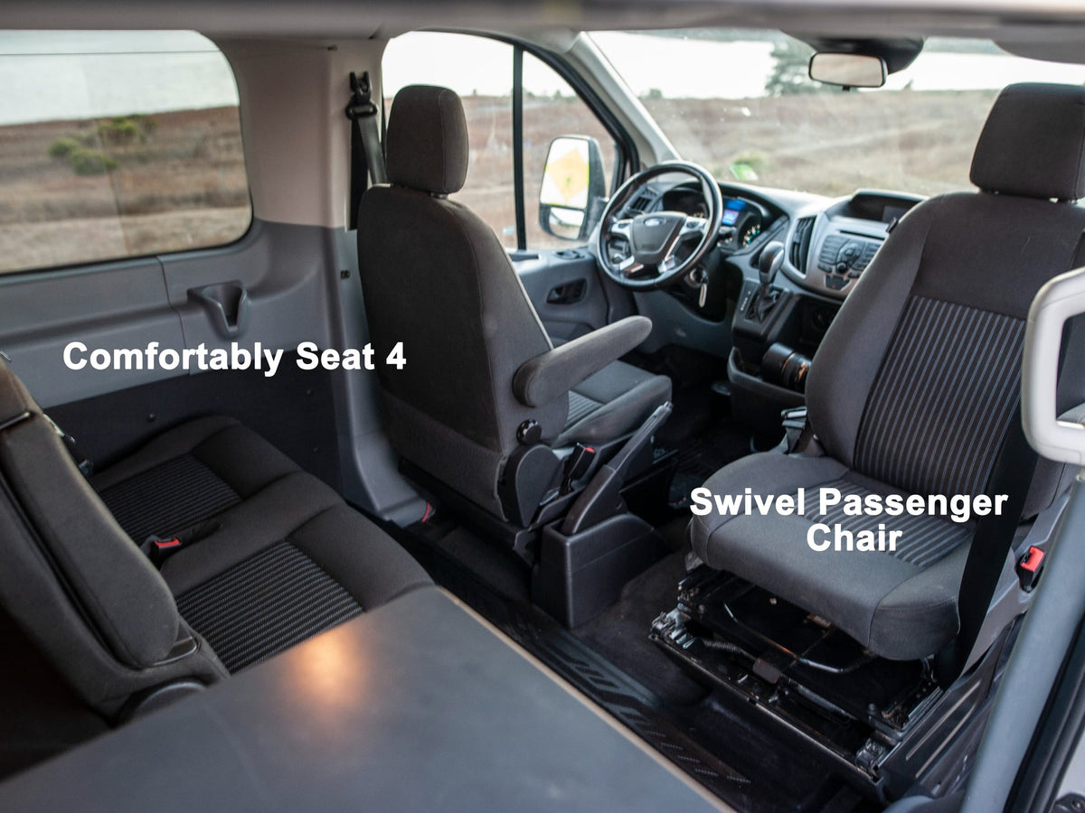 revealing a jack. Folded mattress & curtains are also visible inside the van.|RV rental interior with a kitchenette — photo 17