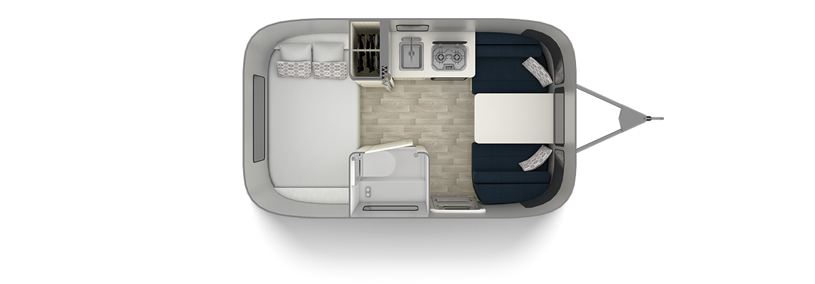 Overhead floor plan of a compact RV rental, showing the interior layout with a bed, kitchen, dinette, and small bathroom.