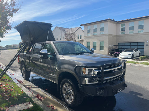 F350 Platinum with rooftop tent overland rental