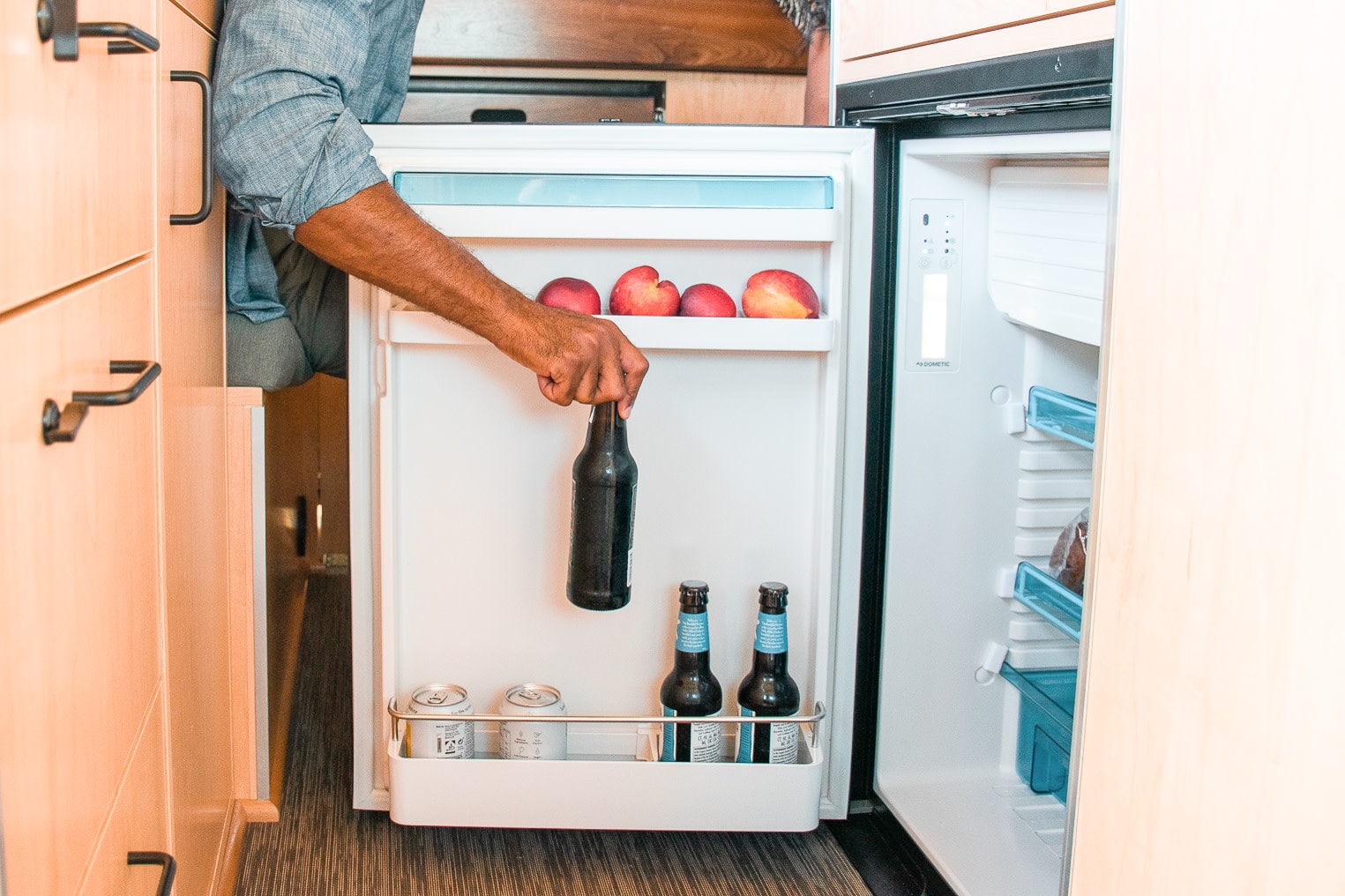 and coffee filters for kitchen essentials.|Inside an RV rental: light wood cabinetry