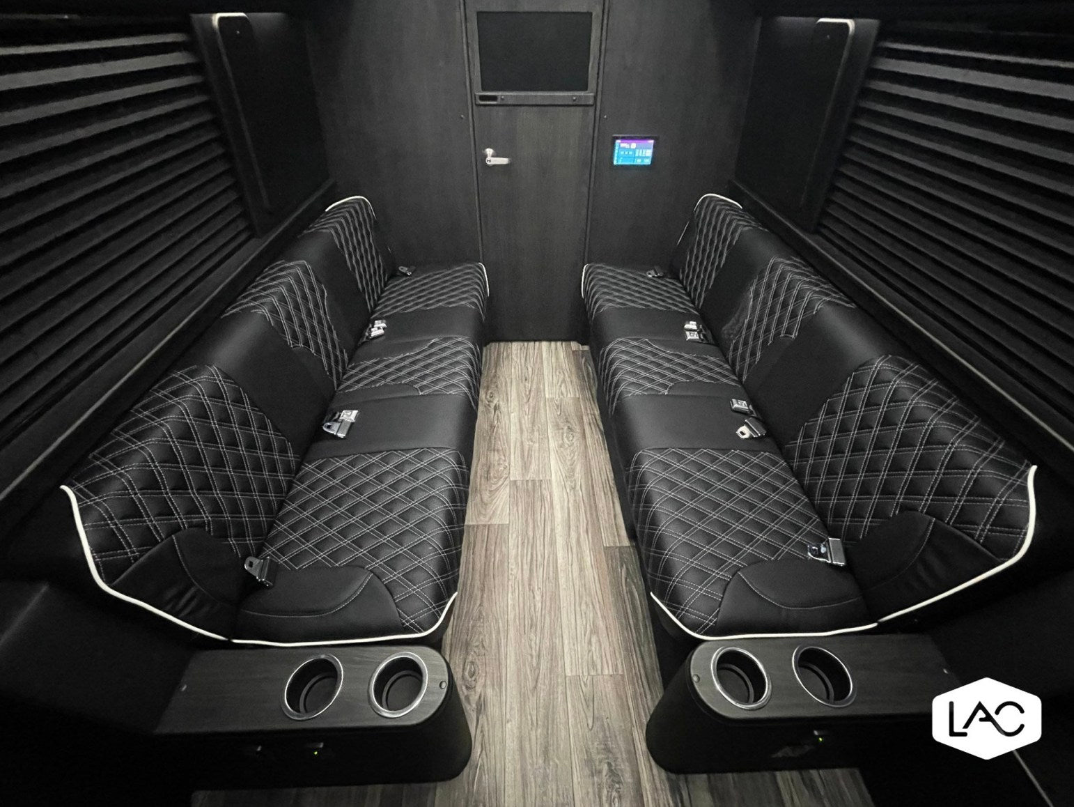 side door open to reveal spacious custom interior. Ideal for rv rental adventures.|Overhead RV rental floor plan (10-passenger) details interior with rear bath