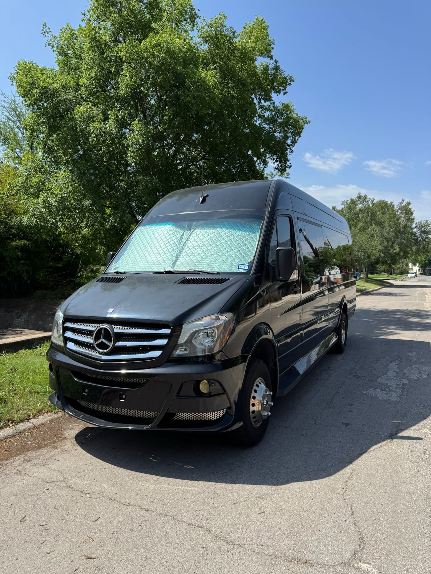 Black Mercedes Sprinter van with sunshade — photo 1