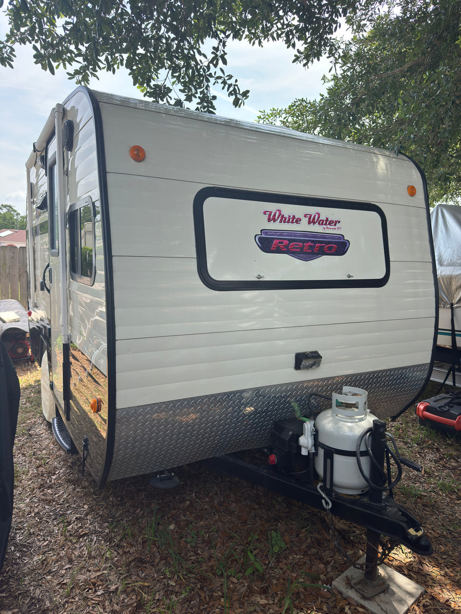 This White Water Retro travel trailer RV rental, with its classic style, is ready for your next adventure.