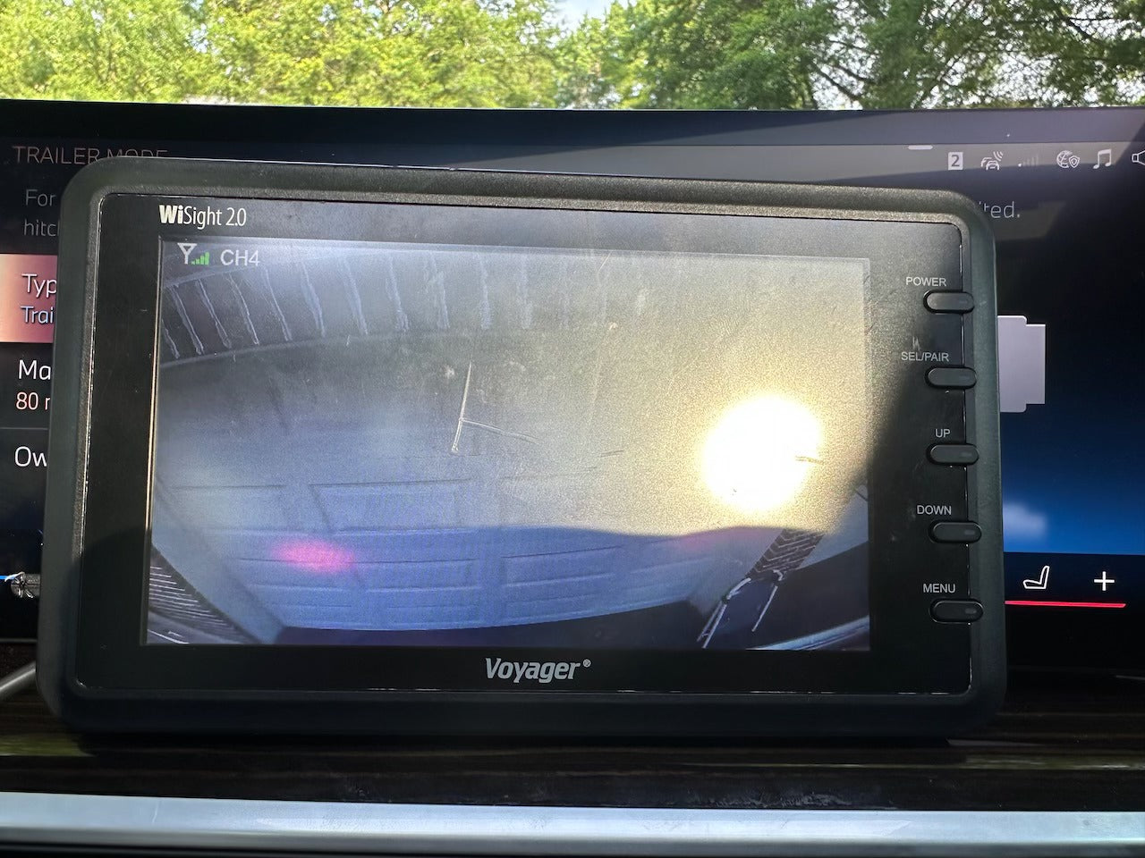 RV rental display: A Voyager WiSight 2.0 monitor shows the rear camera feed, assisting with trailer hitching in an RV.