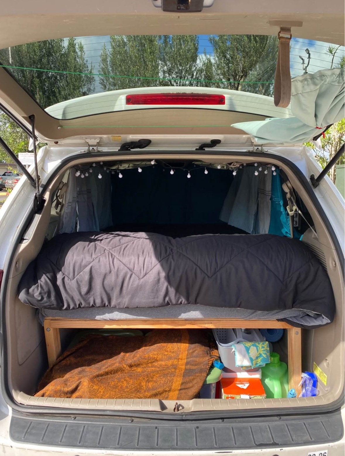 and curtains.|Experience mobile living! This RV rental features a cozy bed — photo 6