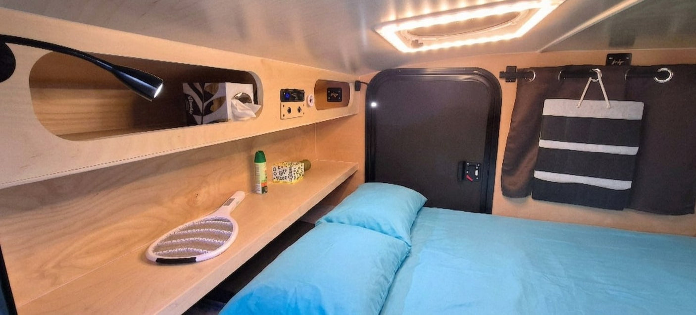 is ready for overlanding. Parked mountainside with open storage