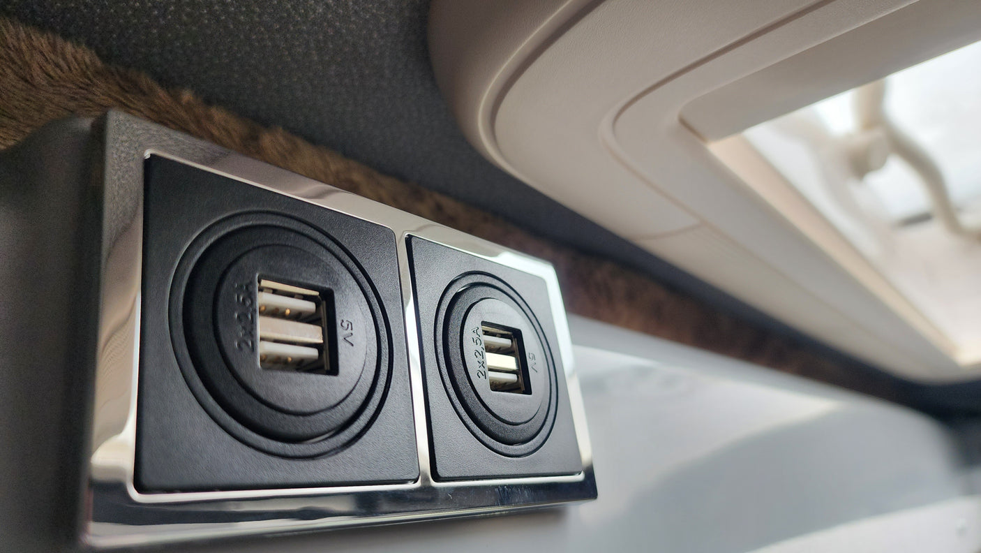 Dual 5V 2x2.5A USB charging ports in an RV rental, providing convenient power for mobile devices.