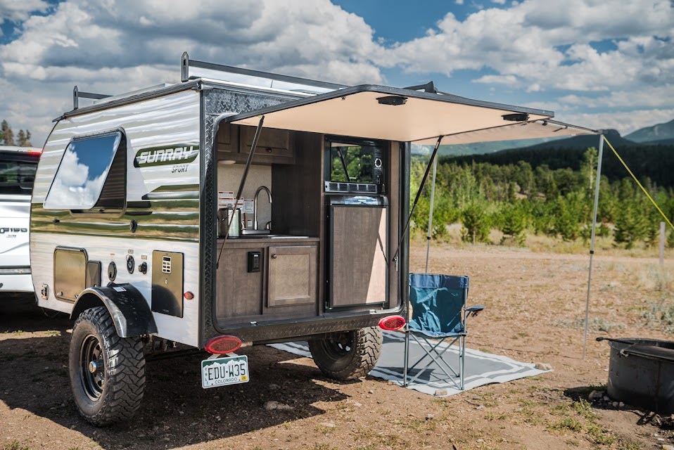 Compact Surray Sport rv rental with an outdoor kitchen setup