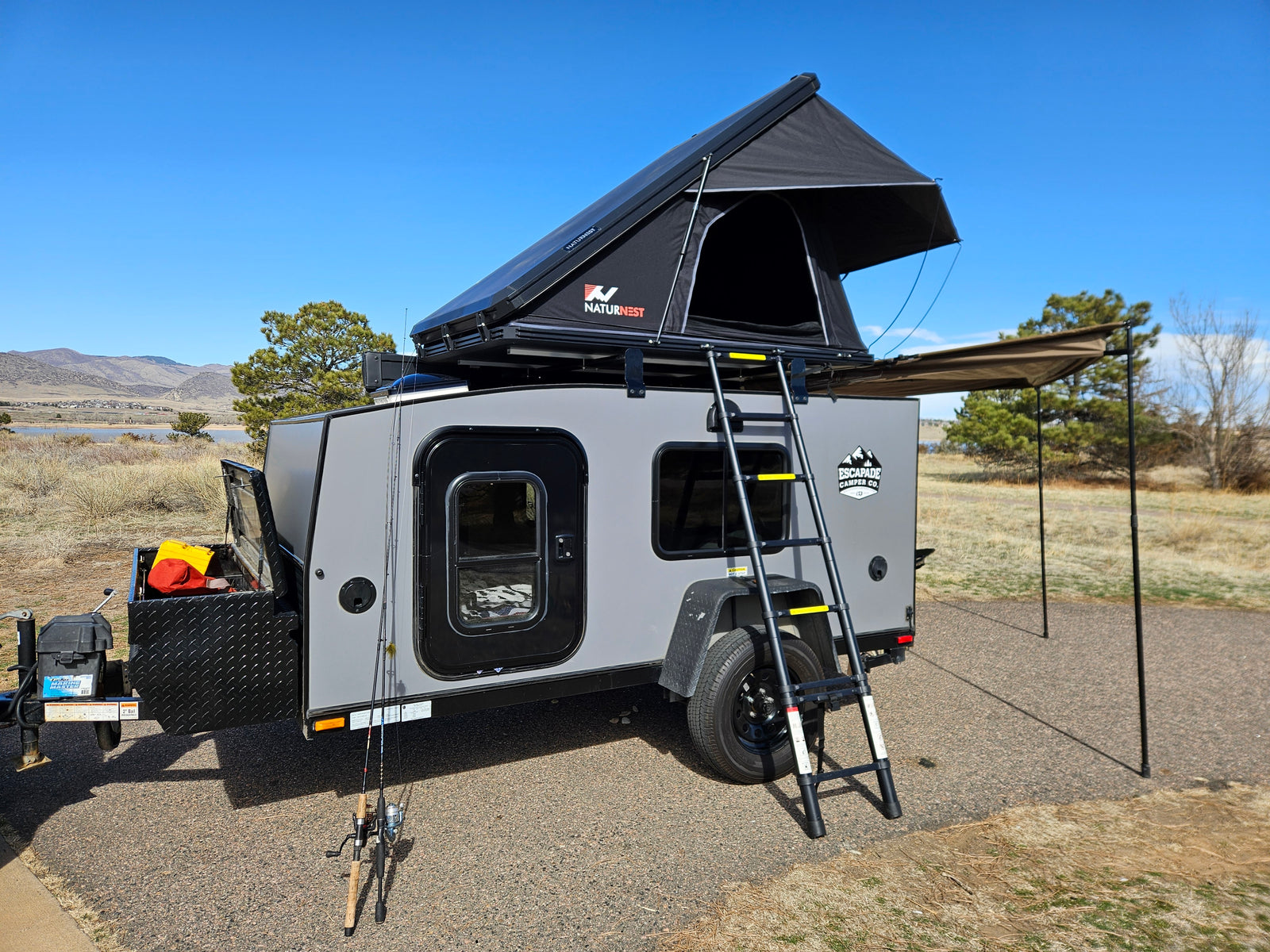 and a comfortable bed.|RV rental camper interior: a cozy bed