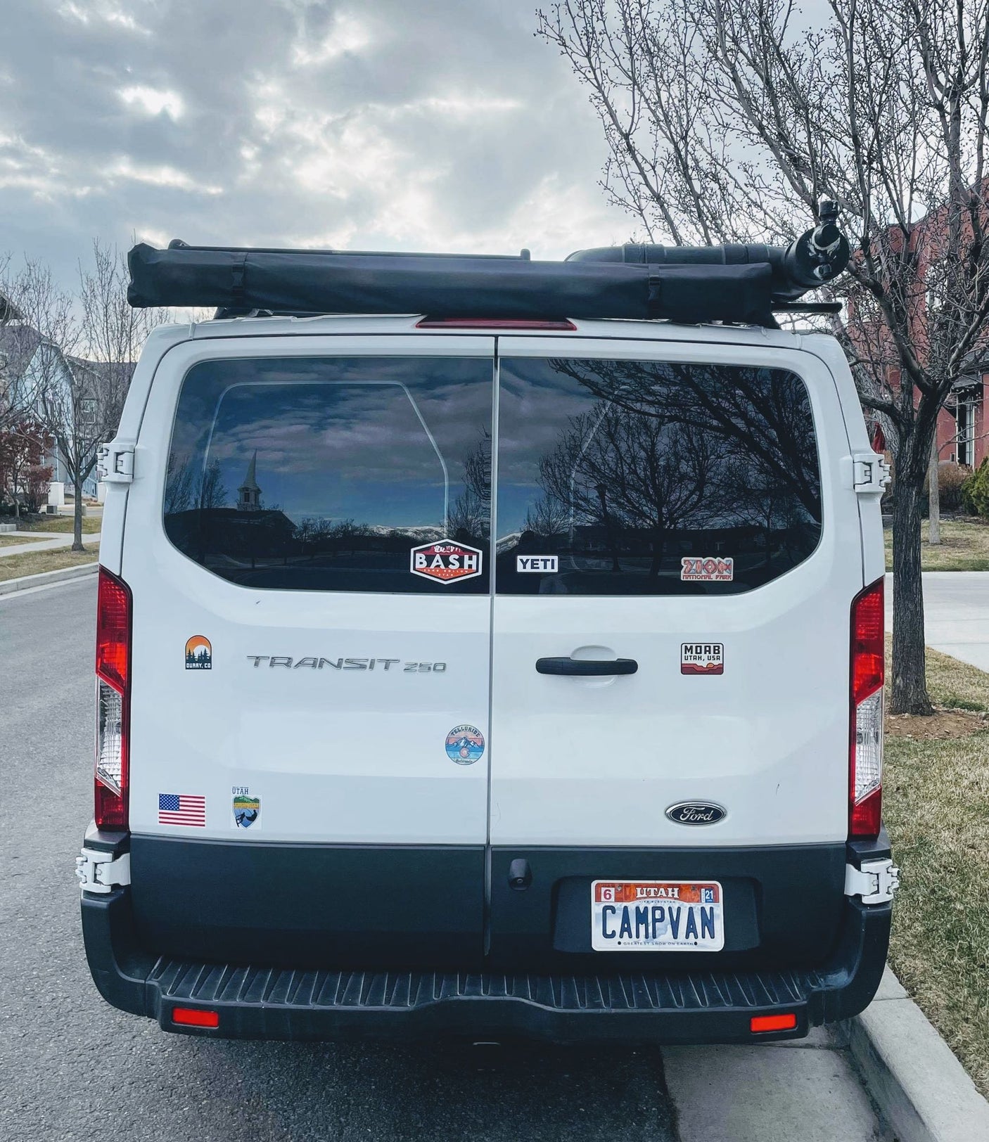 ready for RV rental.|White Ford Transit van