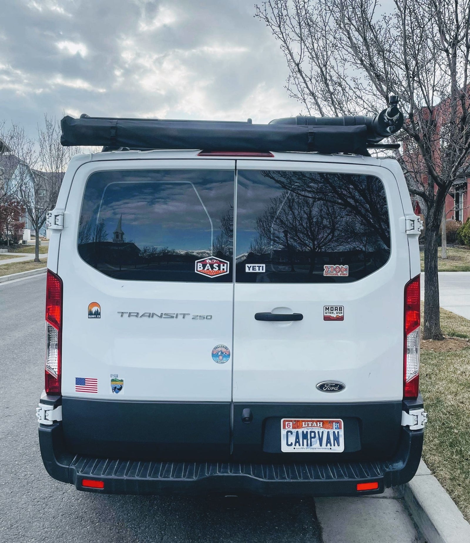 ready for RV rental.|White Ford Transit van