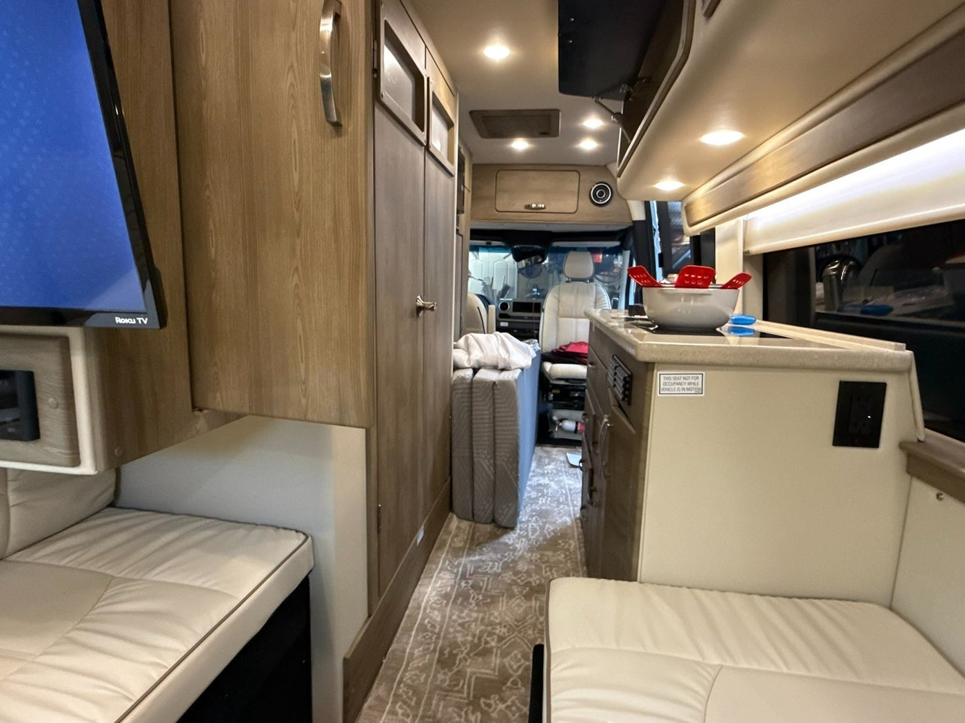 and rear windows.|This rv rental features a spacious — photo 15