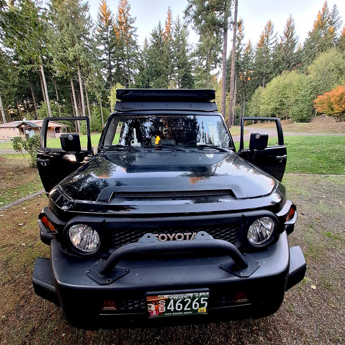 equipped with a rooftop tent