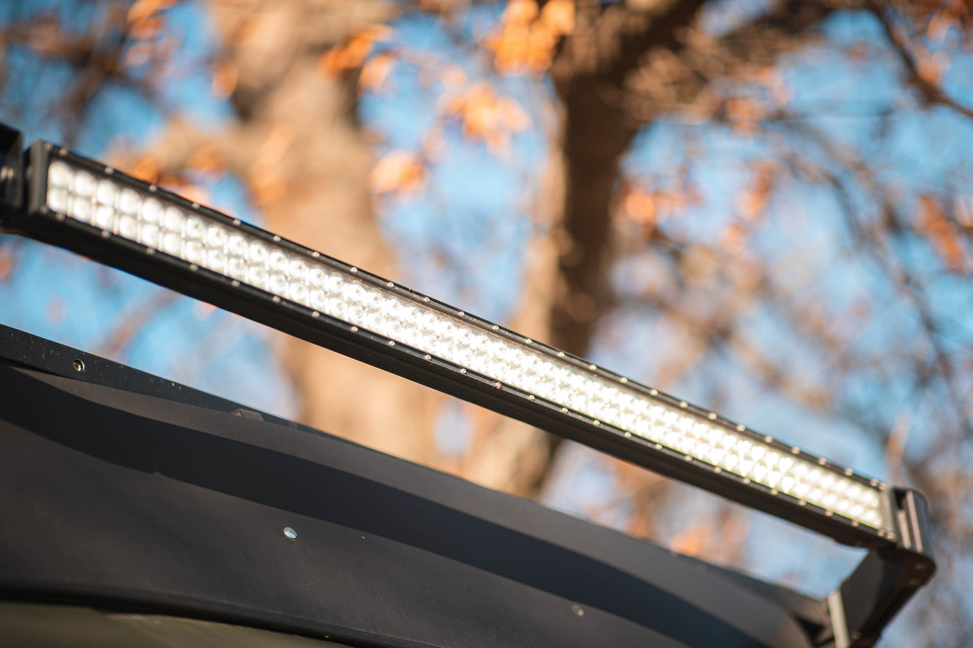 Illuminating LED light bar on a rugged RV rental, ideal for brightening your next outdoor adventure.