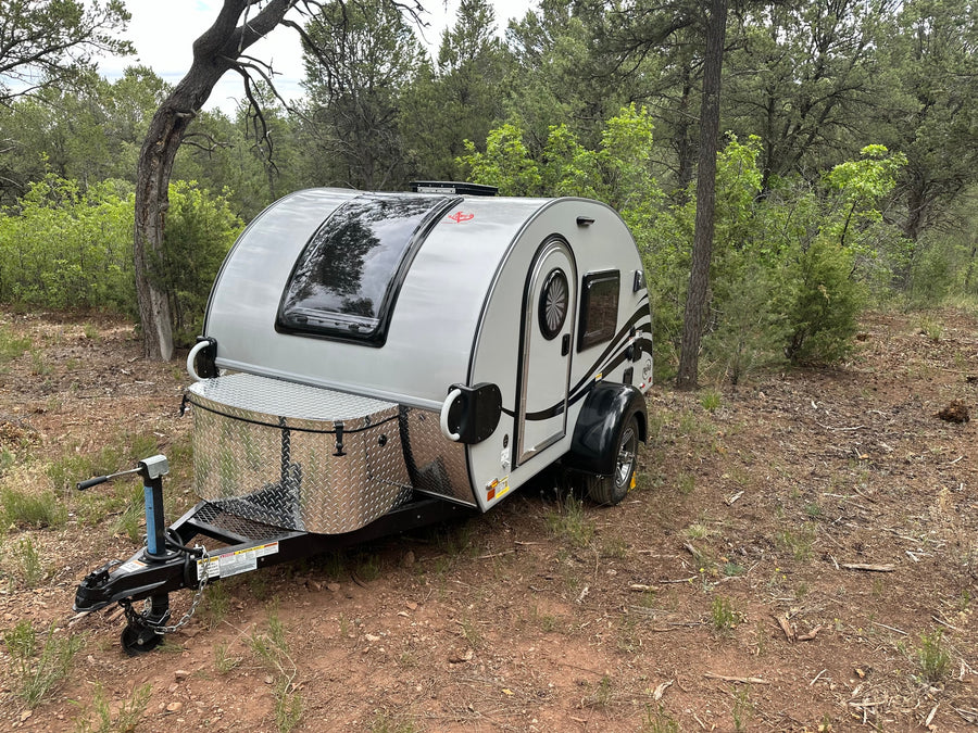 perfect for outdoor camping trips.|This RV rental features a versatile outdoor kitchen with a sink