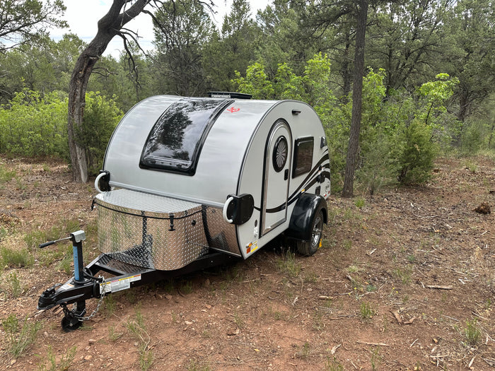 perfect for outdoor camping trips.|This RV rental features a versatile outdoor kitchen with a sink