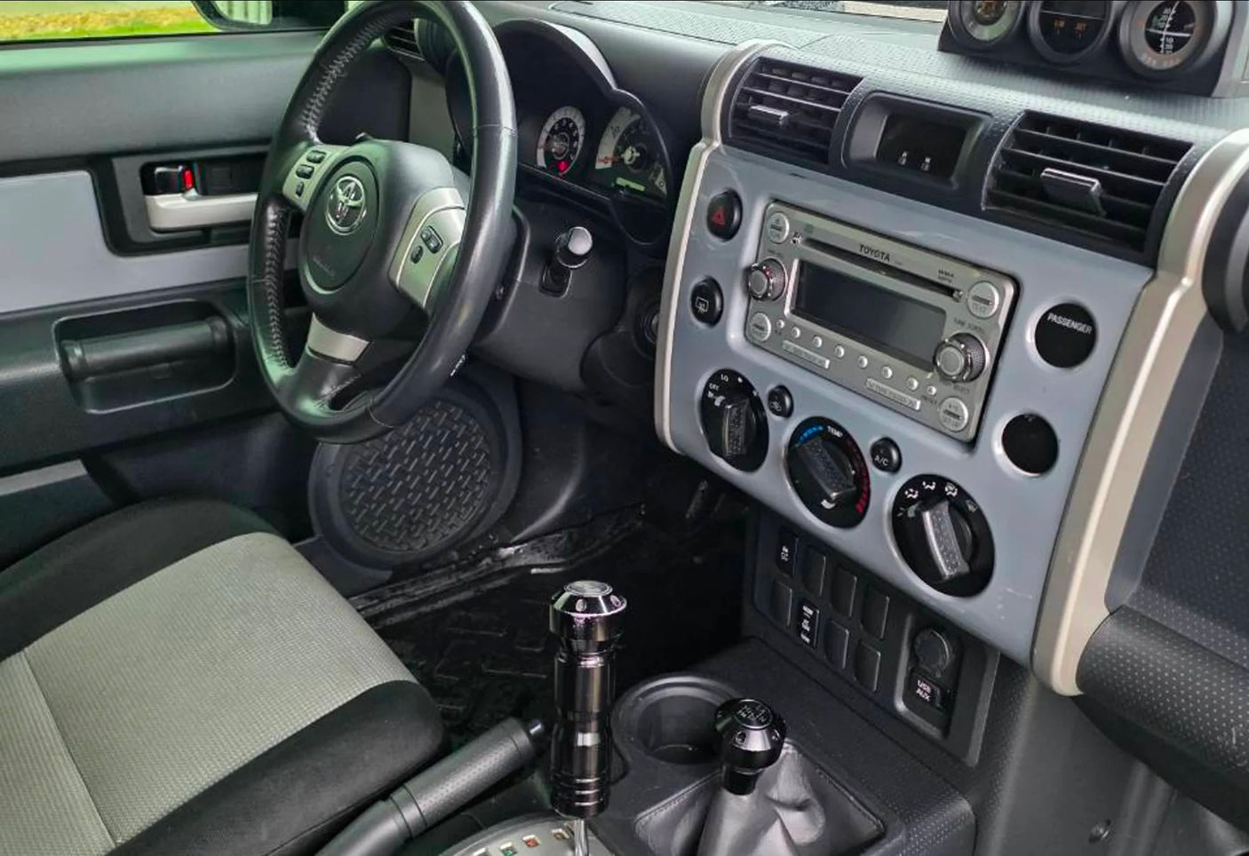 perfect for rugged adventures or an alternative rv rental.|RV rental's overhead console: off-road controls (A-TRAC