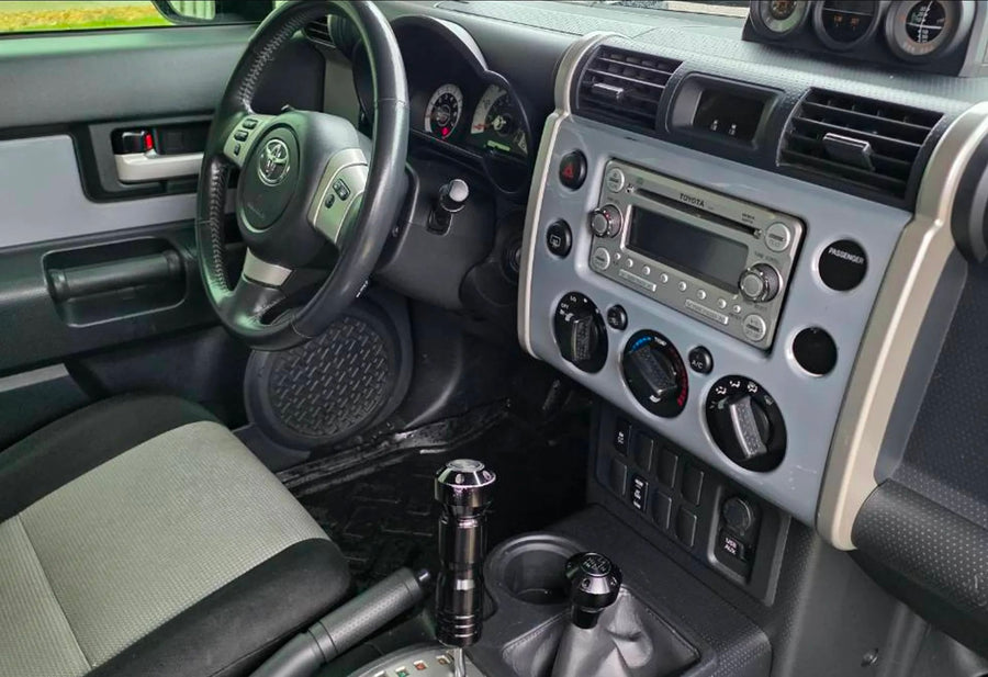 perfect for rugged adventures or an alternative rv rental.|RV rental's overhead console: off-road controls (A-TRAC