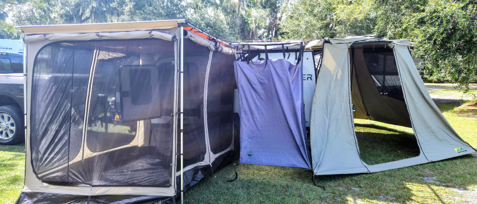 and pull-out Blackstone griddle for camp cooking.|NATURNEST privacy shelter attached to an RV rental