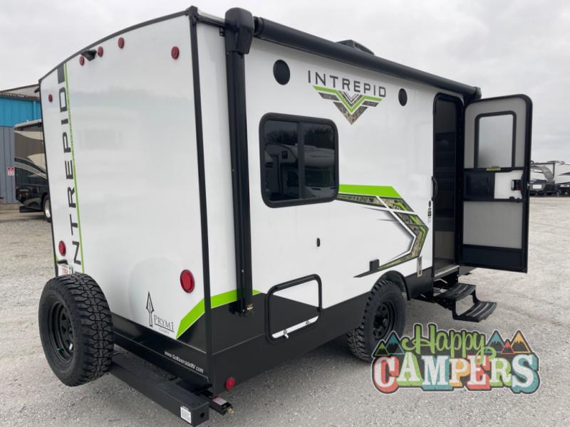 ideal for rv rental adventures.|This white & green Intrepid travel trailer RV